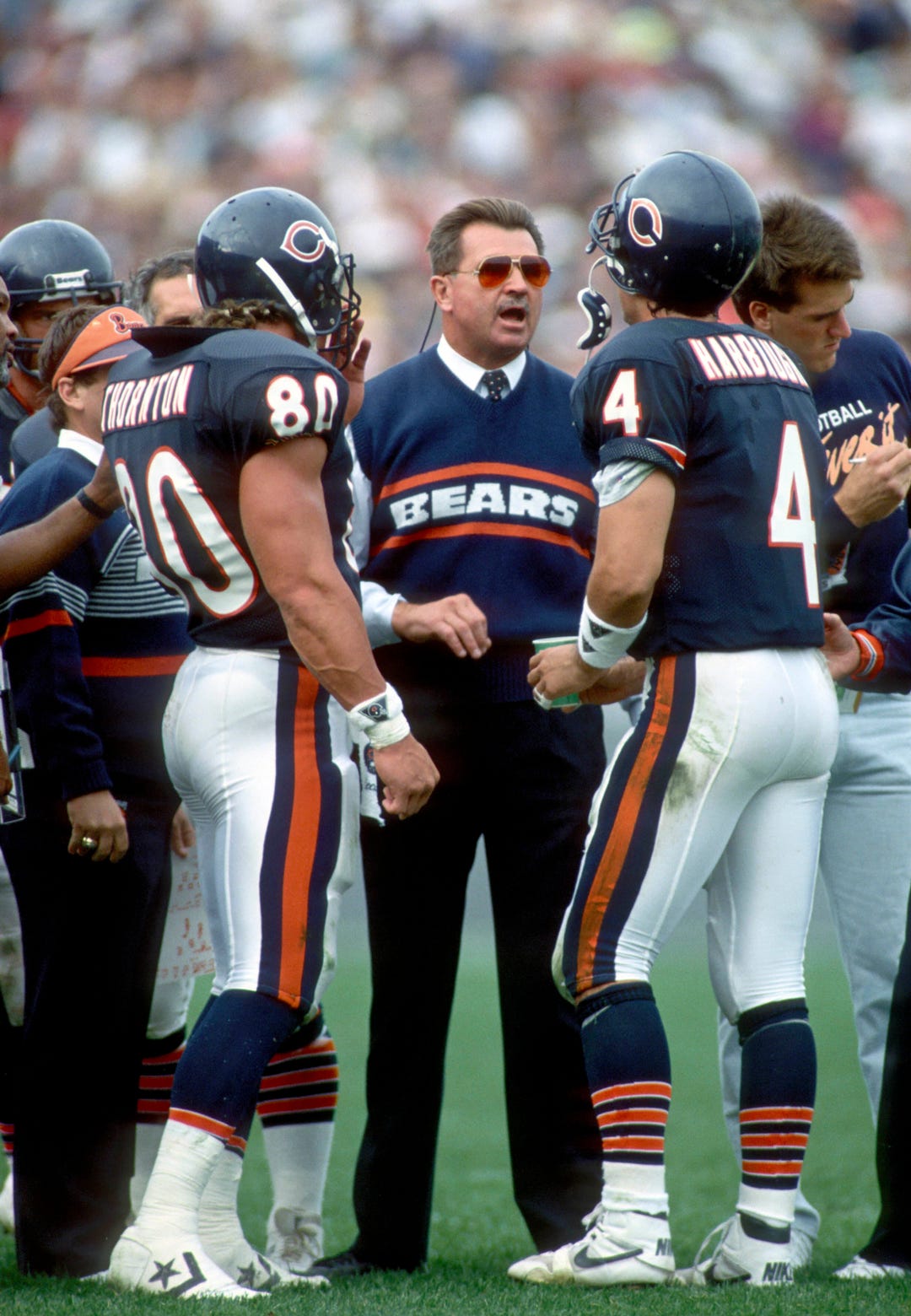 Oct. 29, 1989: Chicago Bears head coach Mike Ditka talks to quarterback Jim Harbaugh during a game against the Los Angeles Rams at Soldier Field.