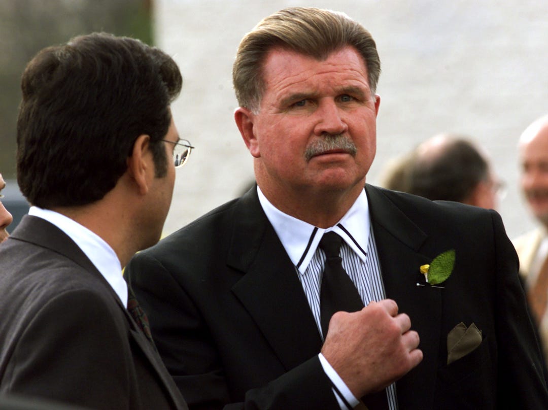 Former Chicago Bears coach Mike Ditka pauses to talk with the media following a private memorial service for the late Chicago Bears running back Walter Payton at Life Changers Church in the Chicago suburb of Barrington, Illinois, November 5. Payton died November 1 of bile duct cancer.