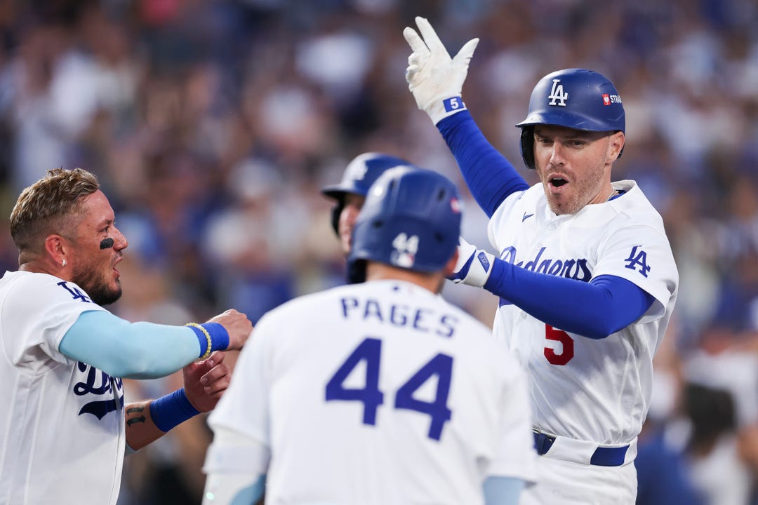 Freddie Freeman #5 of the Los Angeles Dodgers reacts after hitting a solo home run during the fourth inning against the Atlanta Braves in game two of the National League Division Series at Dodger Stadium on October 04, 2026 in Los Angeles, California.