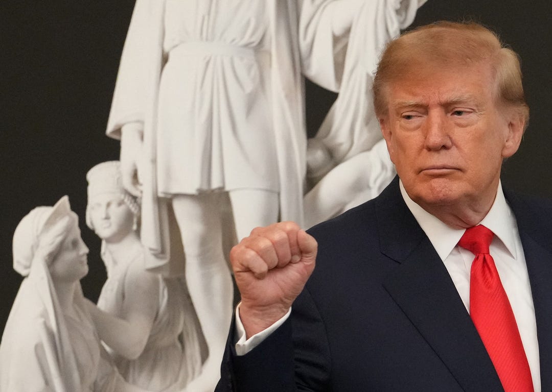 US President Donald Trump gestures at the end of a Columbus Day celebration in the East Room of the White House in Washington, DC, US, October 9, 2026. REUTERS/Eric Lee REFILE - QUALITY REPEAT